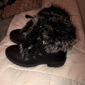 Black boots. Only pair left. Worn once there a little to small I where size ,7